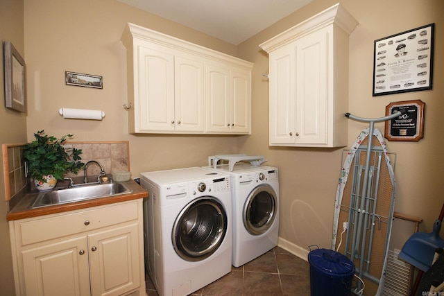 133 Scenic Valley Loop, Maumelle, AR 72113 - washroom with cabinet space, washer and dryer, dark tile patterned floors, and baseboards