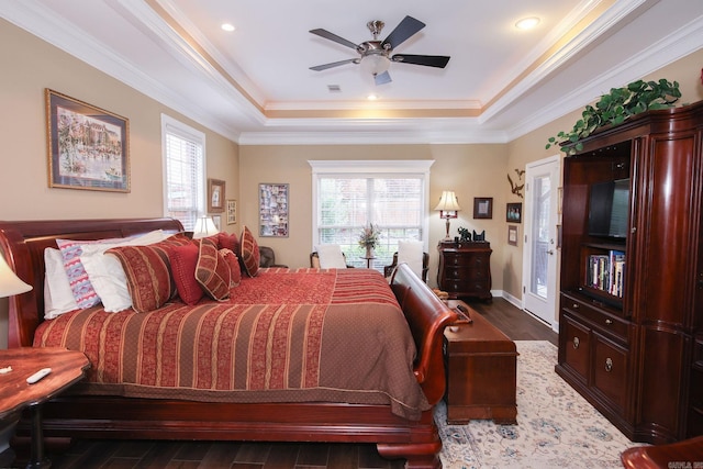 133 Scenic Valley Loop, Maumelle, AR 72113 - bedroom with a raised ceiling, dark wood finished floors, crown molding, and ceiling fan