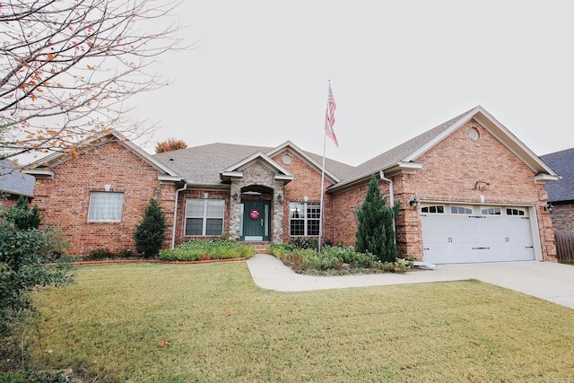 133 Scenic Valley Loop, Maumelle, AR 72113 - view of front of house featuring brick siding, concrete driveway, a front lawn, an attached garage, and a shingled roof