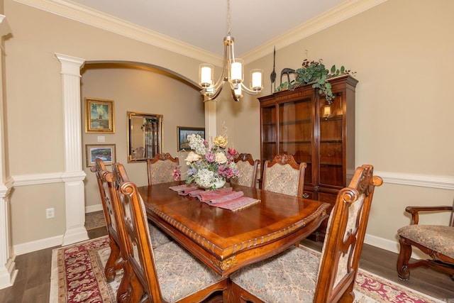 133 Scenic Valley Loop, Maumelle, AR 72113 - dining room with decorative columns, a chandelier, wood finished floors, ornamental molding, and baseboards
