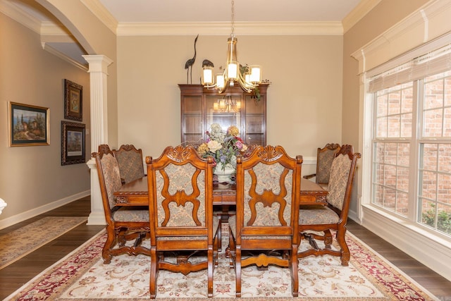 133 Scenic Valley Loop, Maumelle, AR 72113 - dining room with a chandelier, wood finished floors, ornamental molding, baseboards, and arched walkways