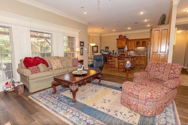 133 Scenic Valley Loop, Maumelle, AR 72113 - living area featuring wood finished floors, crown molding, and recessed lighting