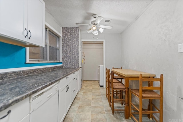 766 Grant 735 Rd, Sheridan, AR 72150 - kitchen with white dishwasher, a textured ceiling, white cabinetry, ceiling fan, and dark countertops