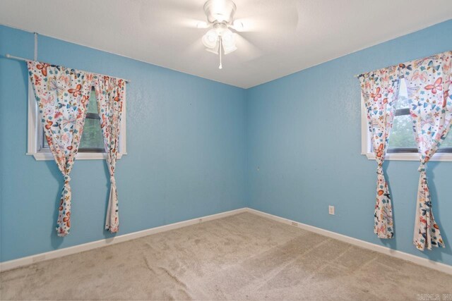 766 Grant 735 Rd, Sheridan, AR 72150 - carpeted spare room with ceiling fan and baseboards