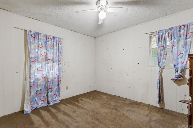 766 Grant 735 Rd, Sheridan, AR 72150 - spare room featuring carpet, a ceiling fan, and a textured ceiling