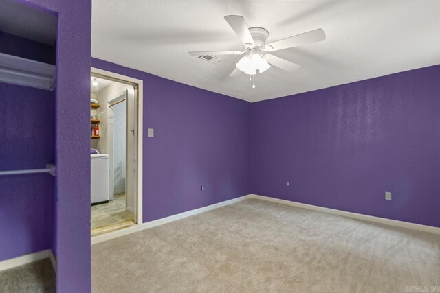 766 Grant 735 Rd, Sheridan, AR 72150 - unfurnished bedroom featuring washer / clothes dryer, carpet flooring, baseboards, and ceiling fan
