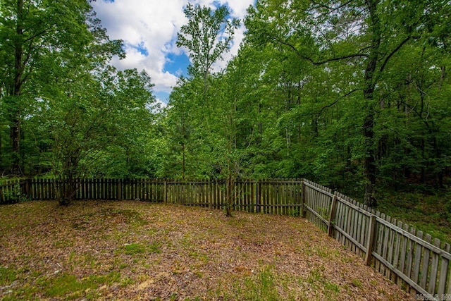 766 Grant 735 Rd, Sheridan, AR 72150 - fenced backyard with a forest view