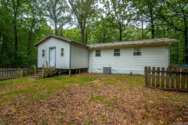 766 Grant 735 Rd, Sheridan, AR 72150 - rear view of house with entry steps and central AC