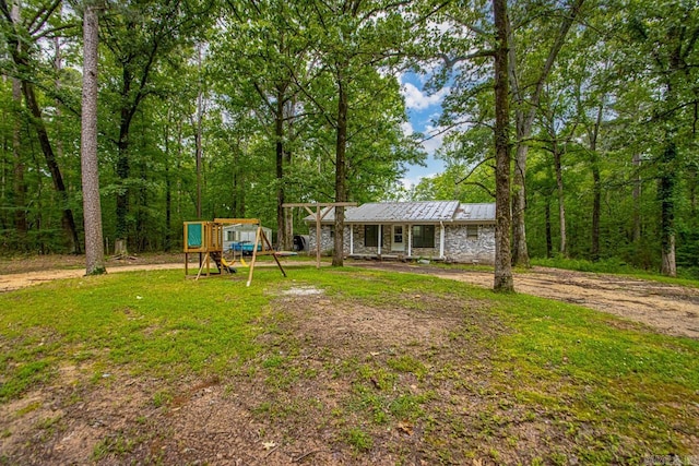 766 Grant 735 Rd, Sheridan, AR 72150 - view of grassy yard featuring a playground and dirt driveway