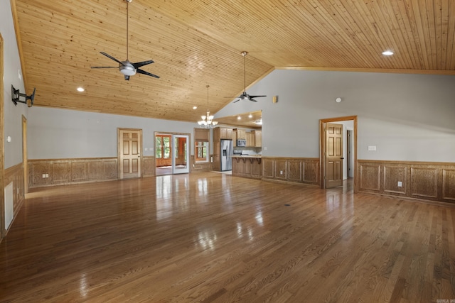 645 Drye Rd, Biscoe, AR 72017 - unfurnished living room with a ceiling fan, a wainscoted wall, wooden ceiling, high vaulted ceiling, and wood finished floors
