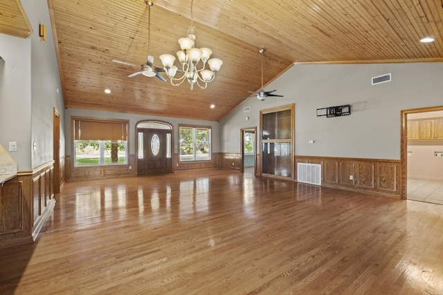 645 Drye Rd, Biscoe, AR 72017 - unfurnished living room with light wood finished floors, a chandelier, a wainscoted wall, a ceiling fan, and wooden ceiling