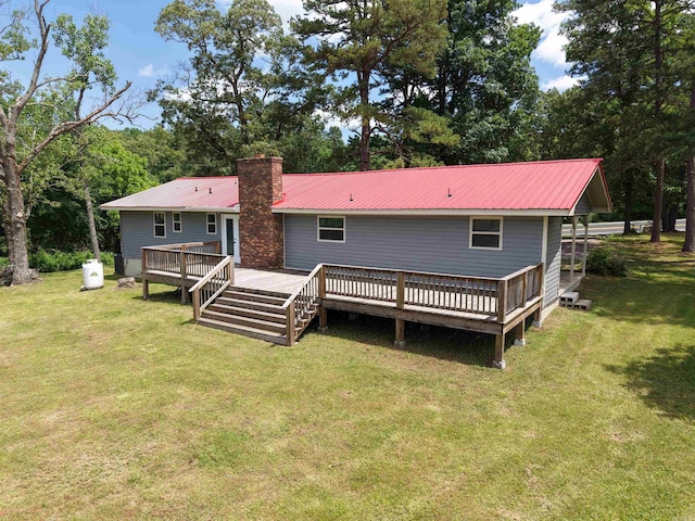 2174 N Main St, Melbourne, AR 72556 - rear view of property featuring a wooden deck, metal roof, a yard, and a chimney