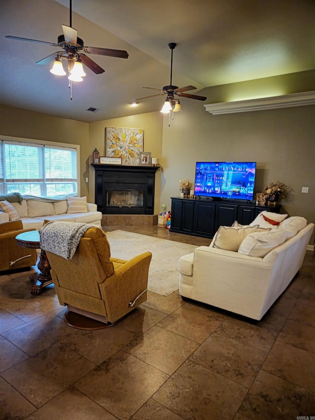 2000 Boundary Oaks Dr, Jonesboro, AR 72404 - living area with lofted ceiling, a glass covered fireplace, and a ceiling fan