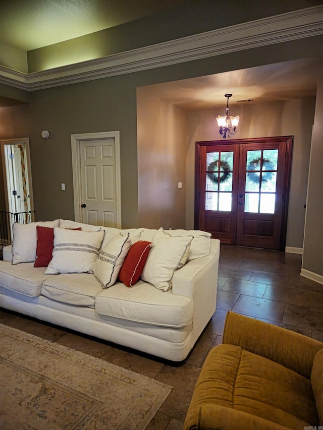 2000 Boundary Oaks Dr, Jonesboro, AR 72404 - living room with a chandelier, baseboards, french doors, and crown molding