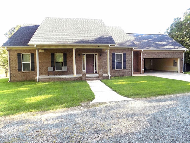 view of front of house with gravel driveway, a porch, brick siding, and a shingled roof