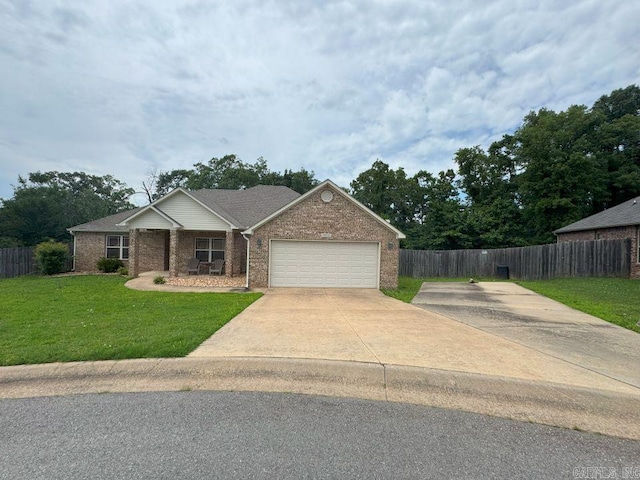 13072 Skyridge Cv, Alexander, AR 72002 - view of front of house with brick siding, a garage, and driveway