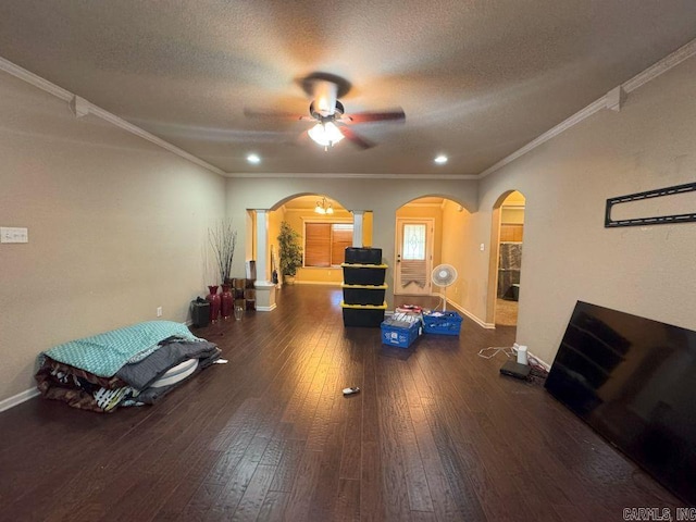 13072 Skyridge Cv, Alexander, AR 72002 - exercise area with arched walkways, ceiling fan, hardwood / wood-style floors, a textured ceiling, and ornamental molding