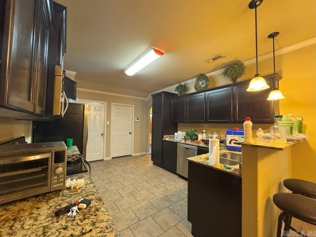 13072 Skyridge Cv, Alexander, AR 72002 - kitchen with stainless steel appliances, crown molding, light stone counters, a breakfast bar, and hanging light fixtures