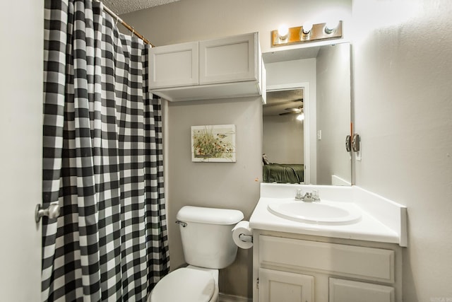 13 Fieldcrest Ln, Cabot, AR 72023 - bathroom with vanity, toilet, a textured ceiling, a ceiling fan, and curtained shower