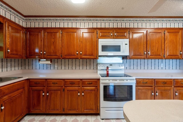 265 Zebulin Dr, Heber Springs, AR 72543 - kitchen with white appliances, light countertops, a textured ceiling, ornamental molding, and wallpapered walls
