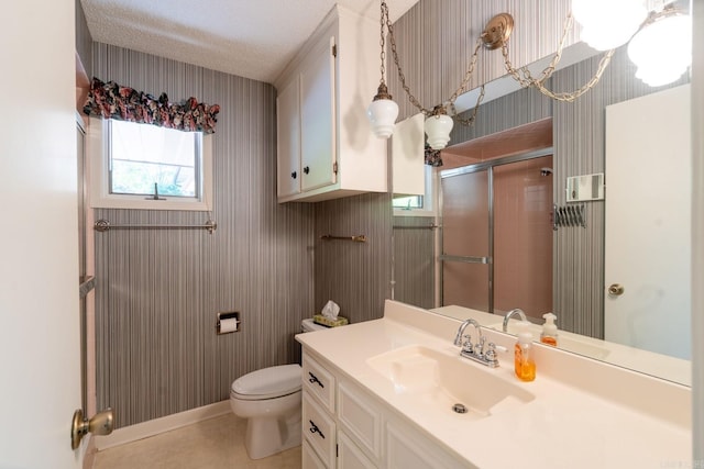 265 Zebulin Dr, Heber Springs, AR 72543 - bathroom featuring toilet, vanity, a stall shower, and wallpapered walls