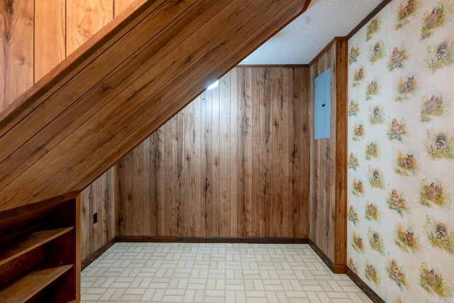 265 Zebulin Dr, Heber Springs, AR 72543 - additional living space featuring brick patterned flooring, vaulted ceiling, wallpapered walls, baseboards, and wood walls