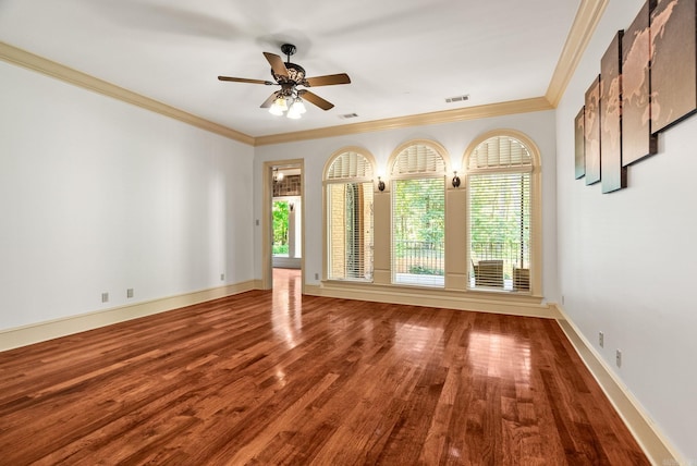 31 Cravache Ct, Little Rock, AR 72223 - spare room with a ceiling fan, crown molding, wood finished floors, and baseboards