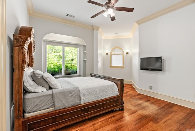 31 Cravache Ct, Little Rock, AR 72223 - bedroom with ornamental molding, wood finished floors, a ceiling fan, and baseboards