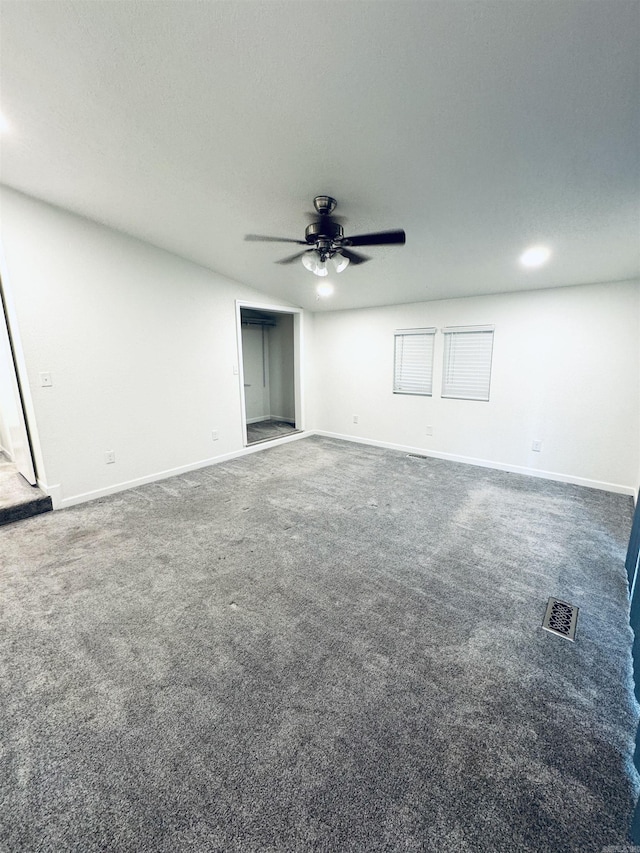 empty room with a ceiling fan, carpet floors, baseboards, and recessed lighting
