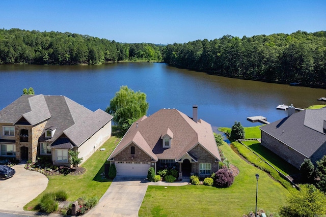 6 W Lake Ln, Little Rock, AR 72210 - aerial view of property and surrounding area with a heavily wooded area and a large body of water