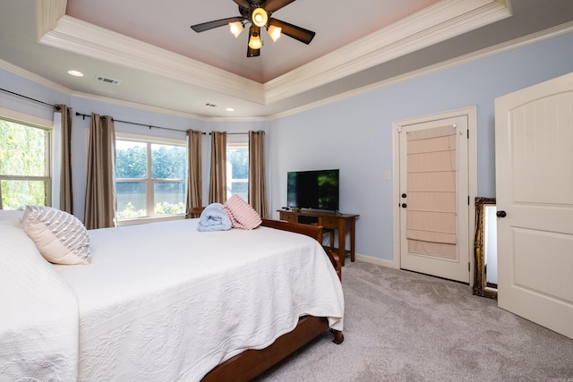 6 W Lake Ln, Little Rock, AR 72210 - bedroom with crown molding, a raised ceiling, light colored carpet, recessed lighting, and baseboards