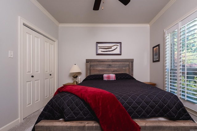 6 W Lake Ln, Little Rock, AR 72210 - carpeted bedroom with crown molding, a closet, a ceiling fan, and baseboards