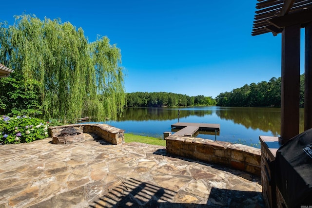 6 W Lake Ln, Little Rock, AR 72210 - view of patio / terrace featuring an outdoor fire pit, a water view, and a forest view