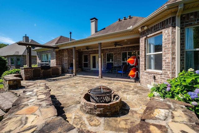 6 W Lake Ln, Little Rock, AR 72210 - view of patio / terrace with an outdoor fire pit and ceiling fan