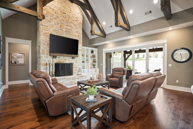 2059 Sloan Lake Dr, Jonesboro, AR 72404 - living area with baseboards, beam ceiling, dark wood finished floors, a stone fireplace, and high vaulted ceiling