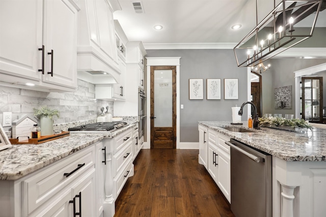 2059 Sloan Lake Dr, Jonesboro, AR 72404 - kitchen featuring stainless steel appliances, a sink, white cabinetry, light stone counters, and recessed lighting