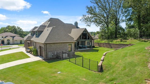 2059 Sloan Lake Dr, Jonesboro, AR 72404 - view of property exterior featuring concrete driveway, brick siding, a chimney, roof with shingles, and a garage