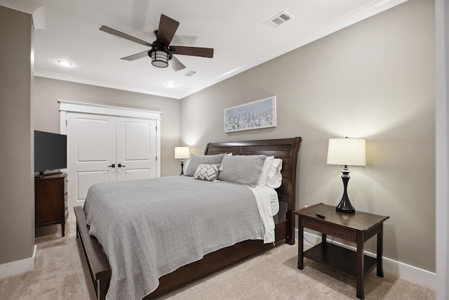 2059 Sloan Lake Dr, Jonesboro, AR 72404 - bedroom featuring light colored carpet, crown molding, a closet, recessed lighting, and baseboards