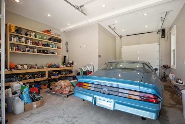 2059 Sloan Lake Dr, Jonesboro, AR 72404 - garage featuring recessed lighting