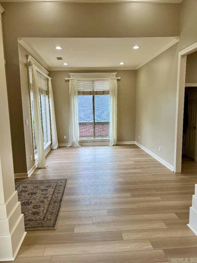 10 Calumet Rd, Little Rock, AR 72223 - empty room featuring crown molding, plenty of natural light, baseboards, light wood-style flooring, and recessed lighting