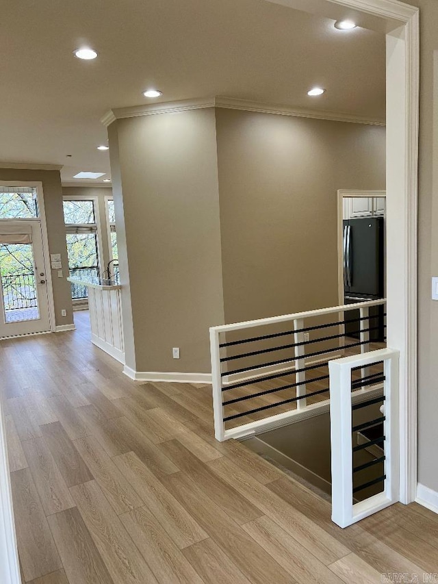 10 Calumet Rd, Little Rock, AR 72223 - hall with an upstairs landing, ornamental molding, light wood-style flooring, baseboards, and recessed lighting