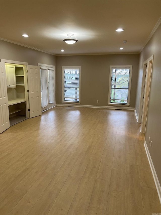 10 Calumet Rd, Little Rock, AR 72223 - spare room featuring ornamental molding, recessed lighting, light wood finished floors, and baseboards