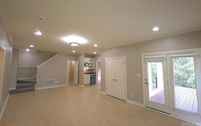 10 Calumet Rd, Little Rock, AR 72223 - unfurnished living room with stairway, light wood finished floors, baseboards, recessed lighting, and crown molding