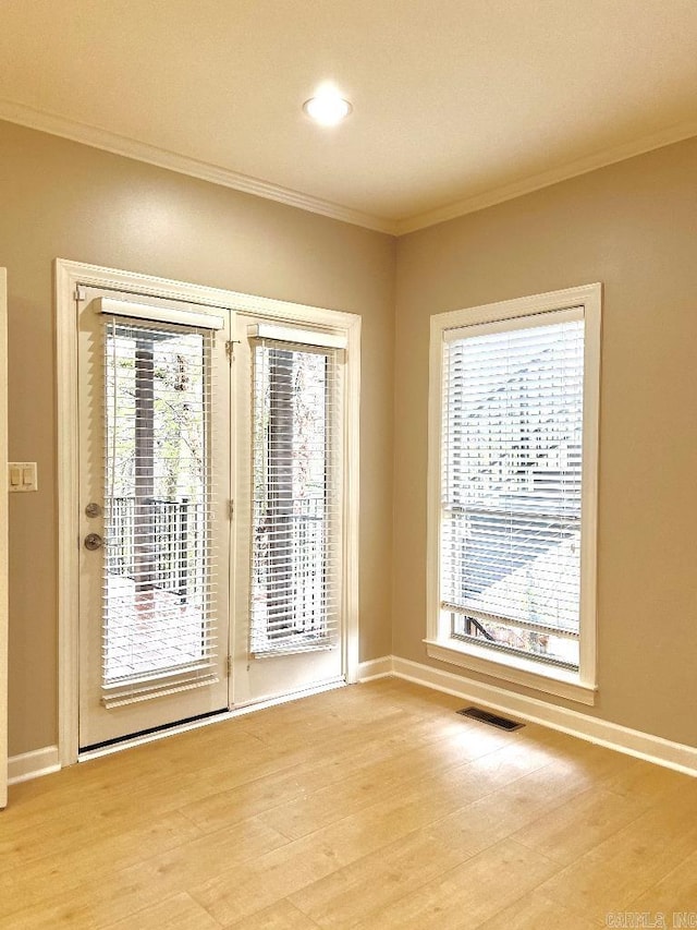 10 Calumet Rd, Little Rock, AR 72223 - spare room featuring crown molding, light wood-type flooring, baseboards, and recessed lighting