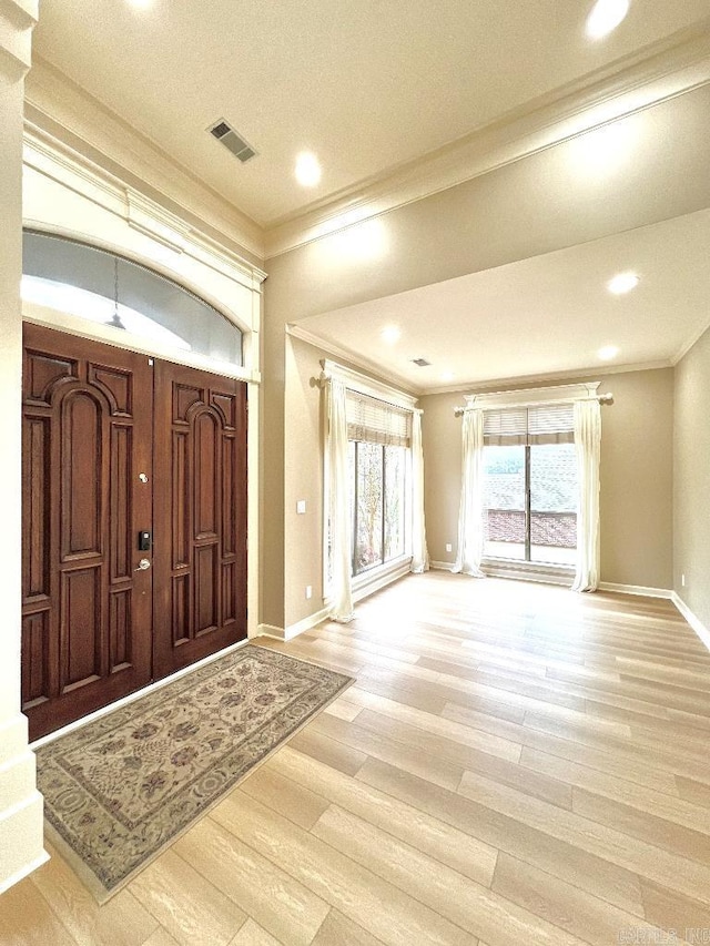 10 Calumet Rd, Little Rock, AR 72223 - foyer entrance with ornamental molding, wood finished floors, baseboards, and recessed lighting