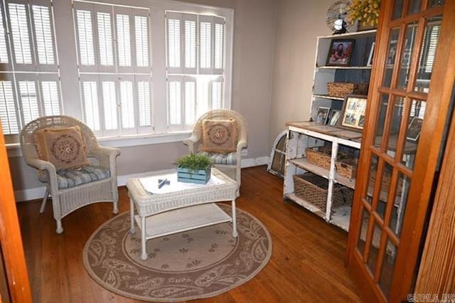 605 School St, Sheridan, AR 72150 - sitting room with wood finished floors and baseboards