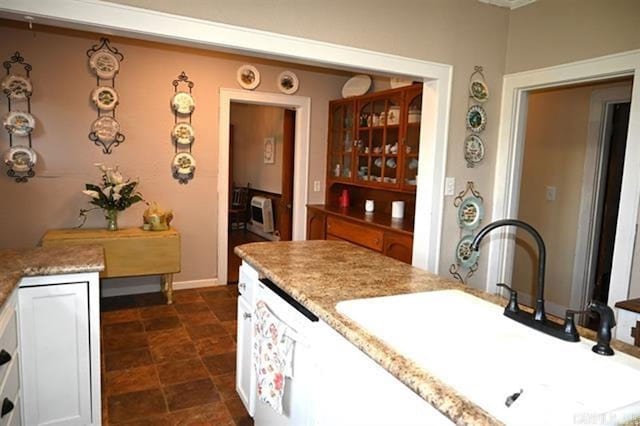 605 School St, Sheridan, AR 72150 - kitchen featuring a sink, dishwasher, and light stone counters