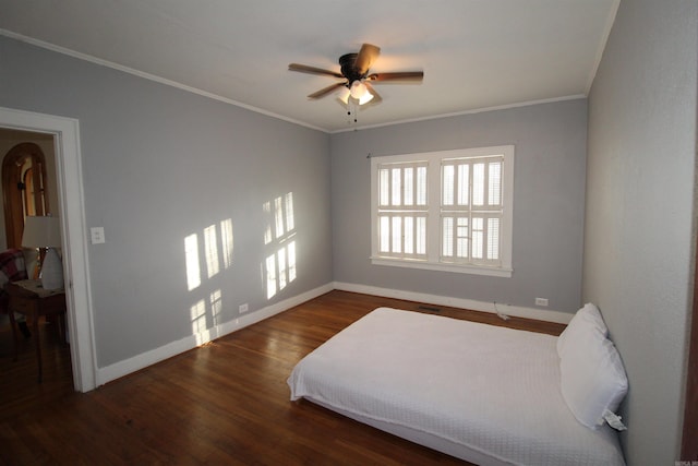 605 School St, Sheridan, AR 72150 - bedroom with baseboards, ornamental molding, wood finished floors, and ceiling fan