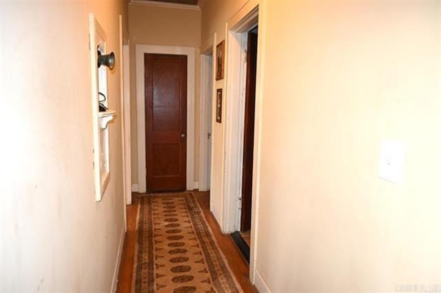 605 School St, Sheridan, AR 72150 - corridor featuring wood finished floors, baseboards, and ornamental molding