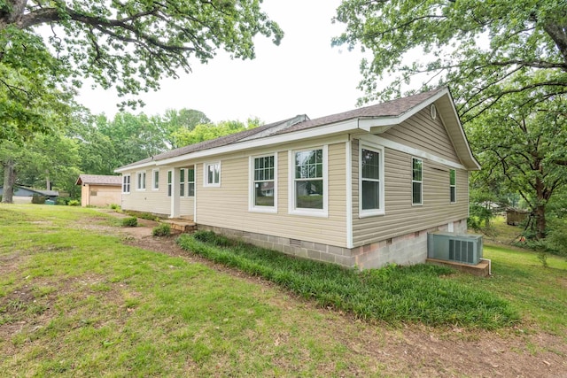 919 River Rdg, Benton, AR 72019 - view of side of property with central air condition unit, a yard, crawl space, and a shingled roof